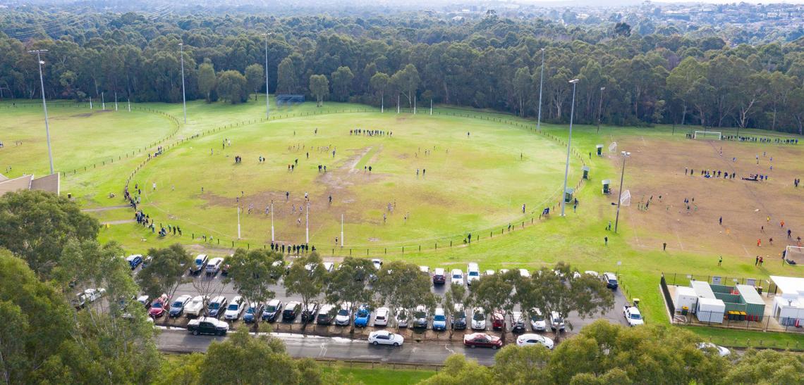 Arial shot of the Bulleen Park ovals and a busy carpark in the foreground